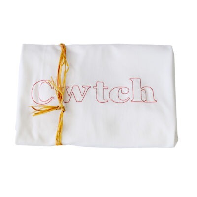 Organic cotton baby blanket gift with Cwtch design.